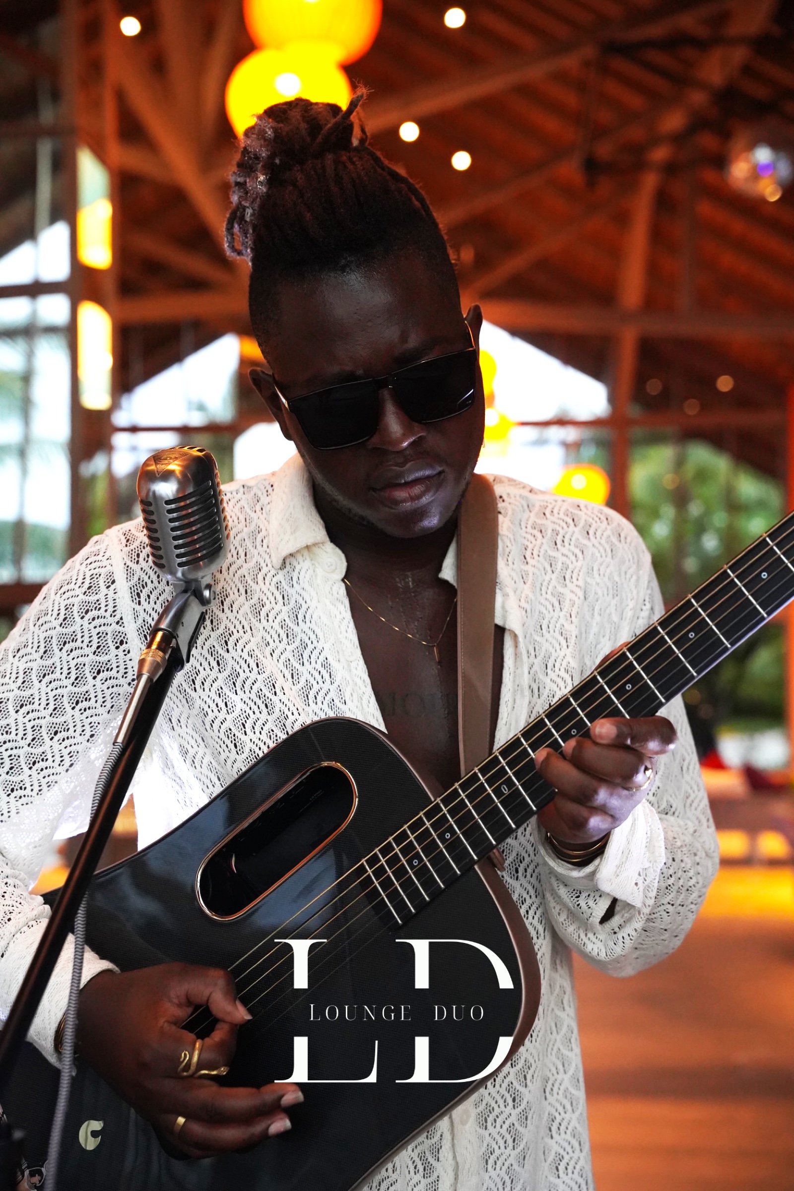 Eric Maseko performing an acoustic set in the Maldives