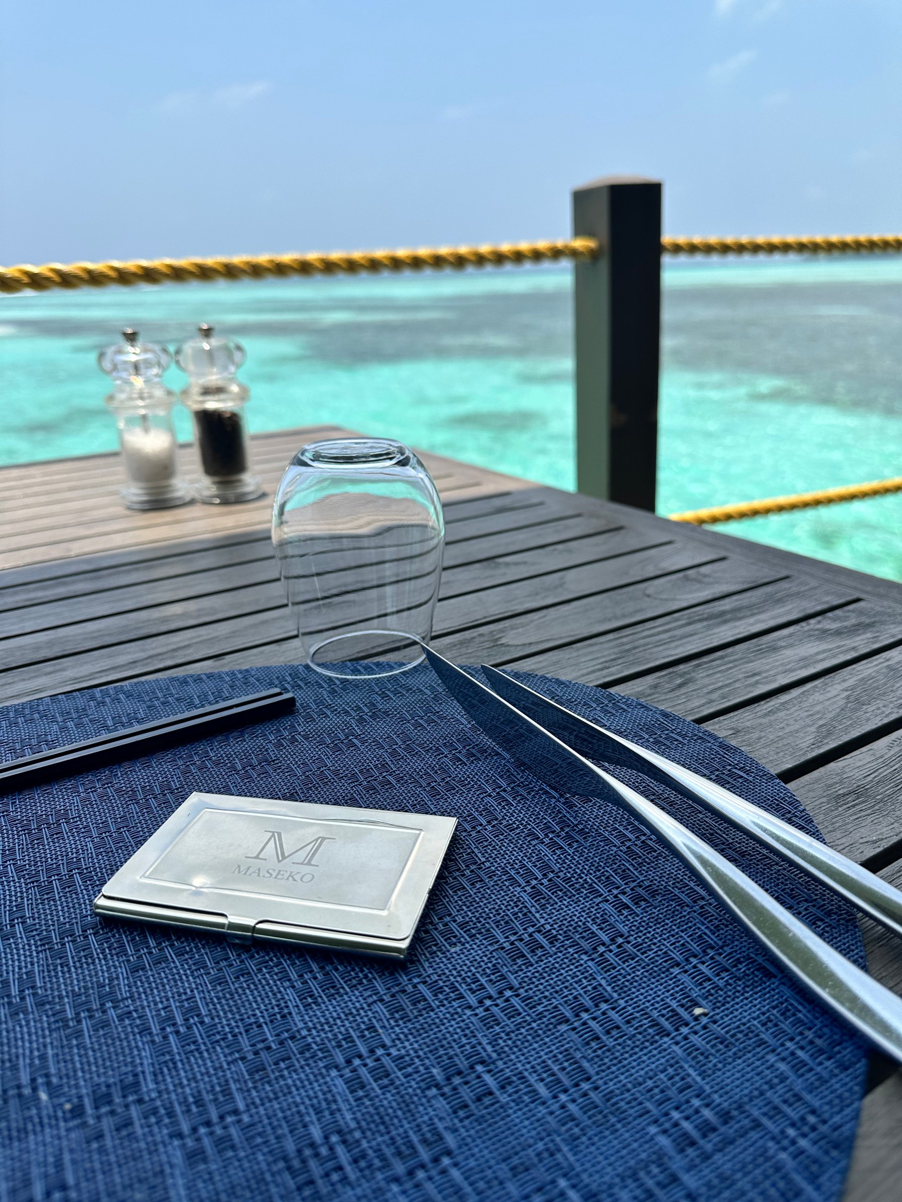 Table setting overlooking the Maldivian lagoon