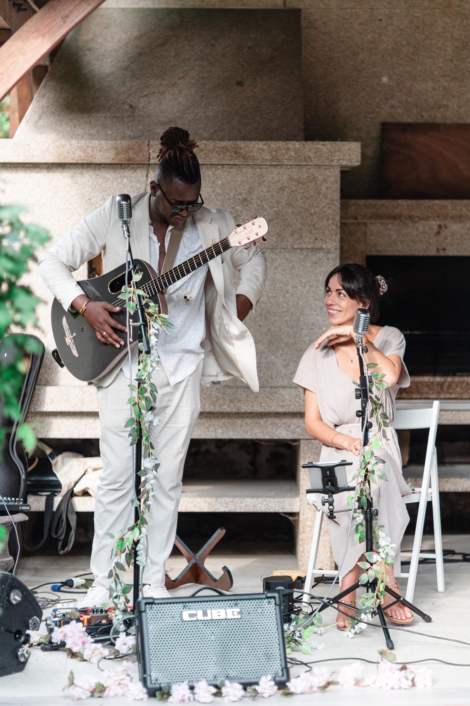 Guitar and vocal duo set up for a wedding ceremony