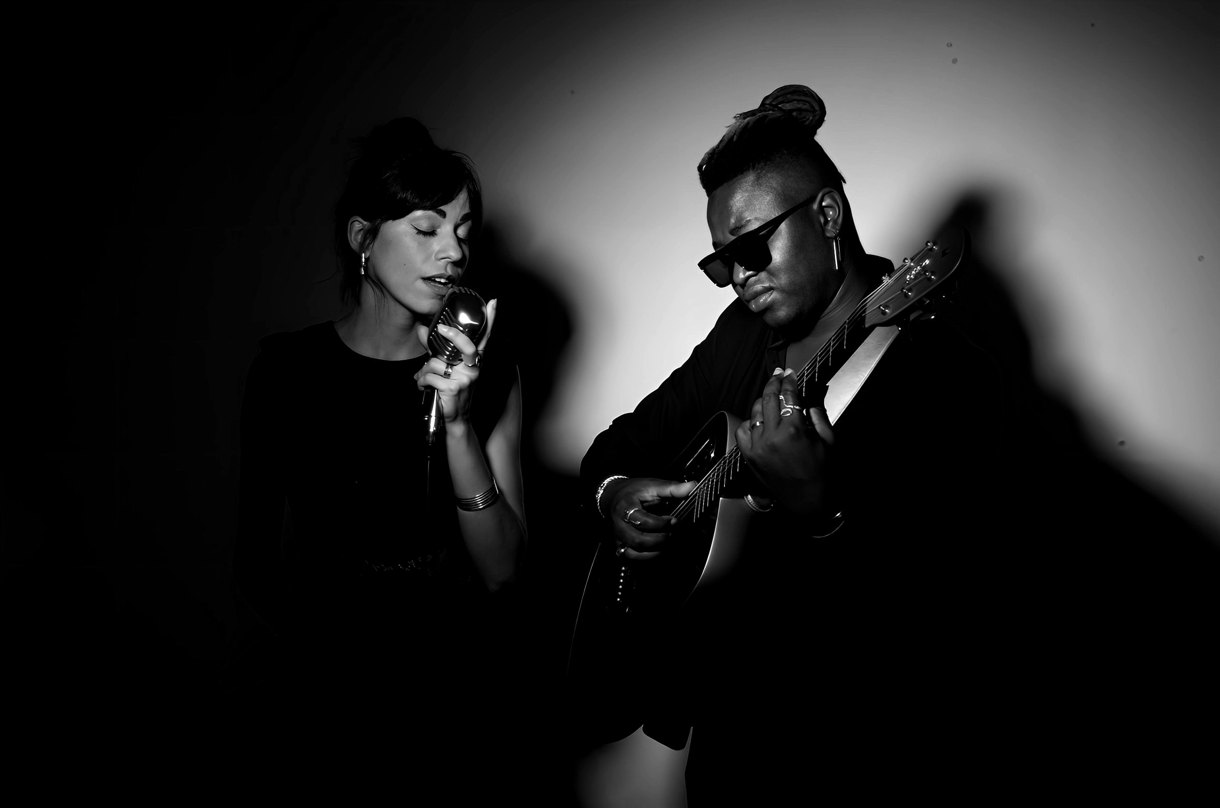 Black-and-white portrait of Marie Oya and Eric Maseko