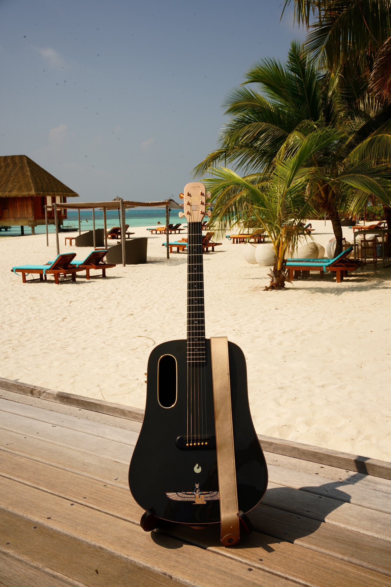LoungeDuo's guitar on a beach in the Maldives