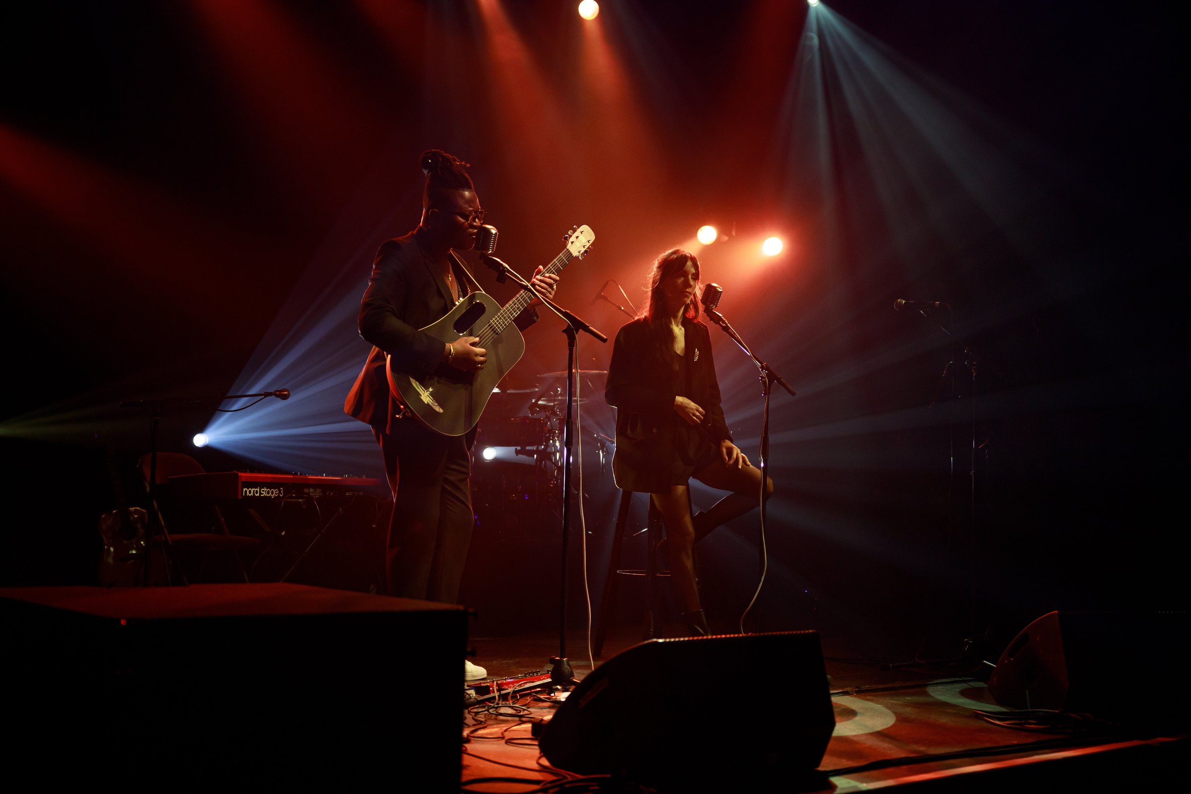 LoungeDuo performing on a night-time stage