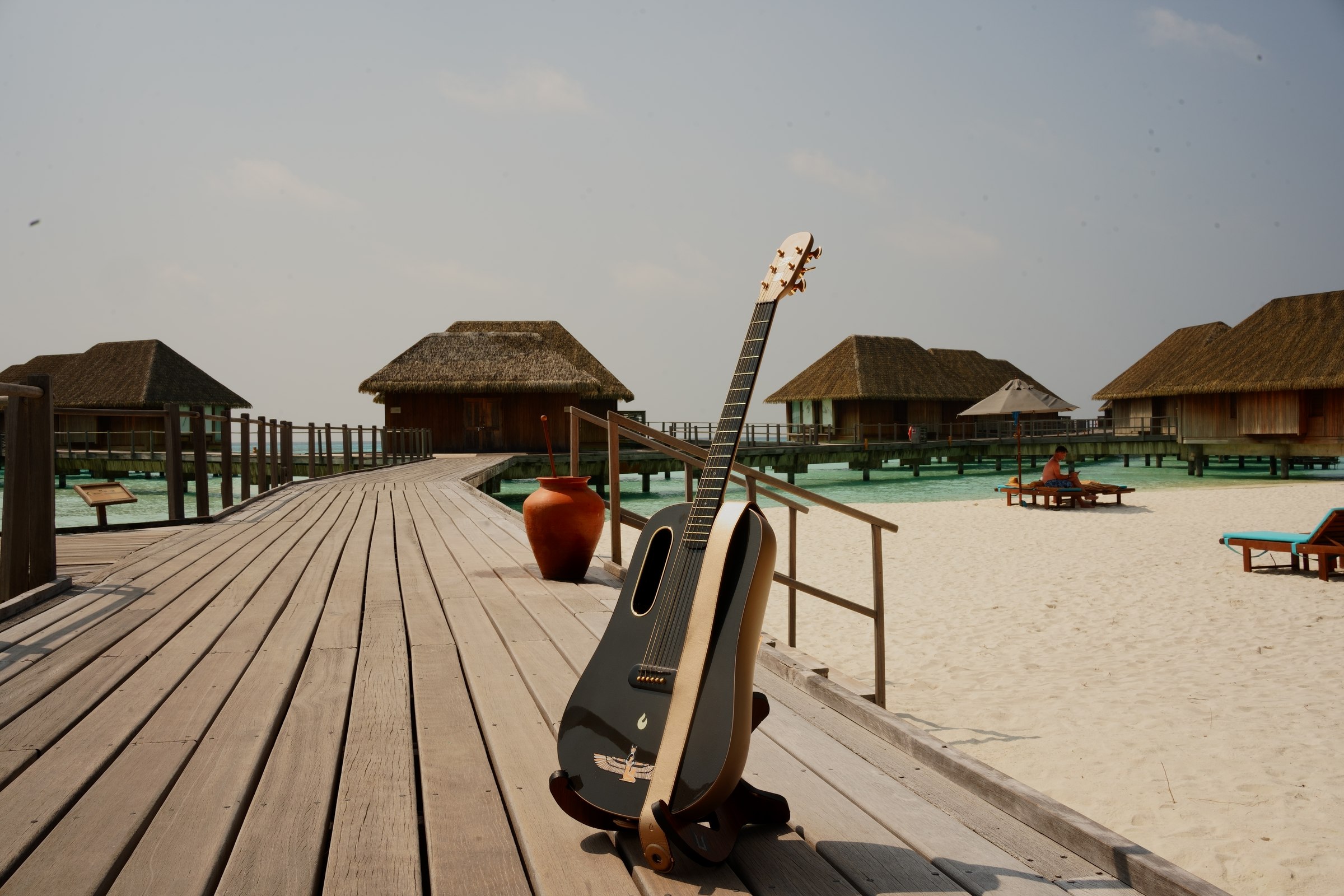 LoungeDuo guitar facing overwater villas