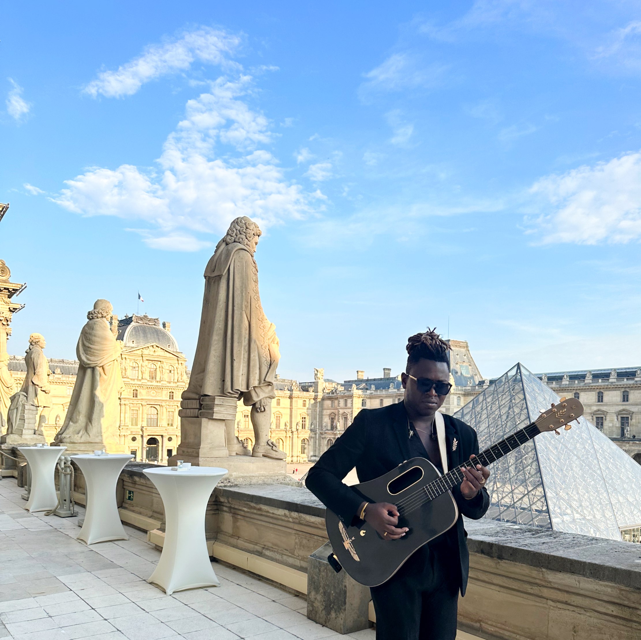 Eric Maseko in Paris with his guitar