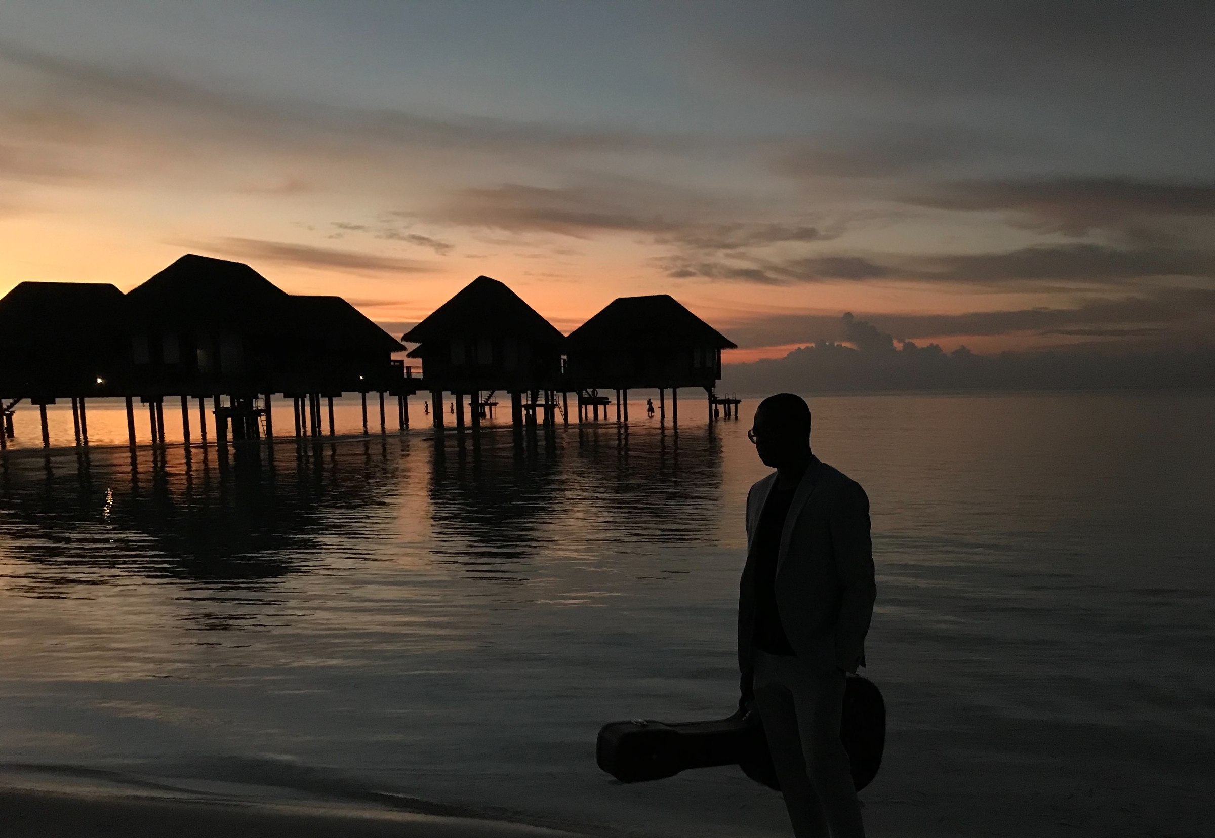 Eric Maseko facing a Maldivian sunset