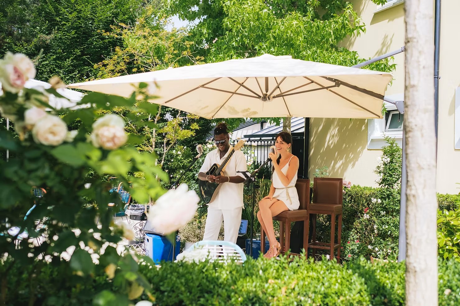 LoungeDuo performing outdoors at a wedding